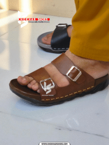 A pair of men's stylish two-strap sandals, with one in a dark brown color and the other in a deep blue-grey.