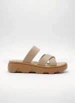 Women wearing beige cross-strap comfort sandals with cushioned sole